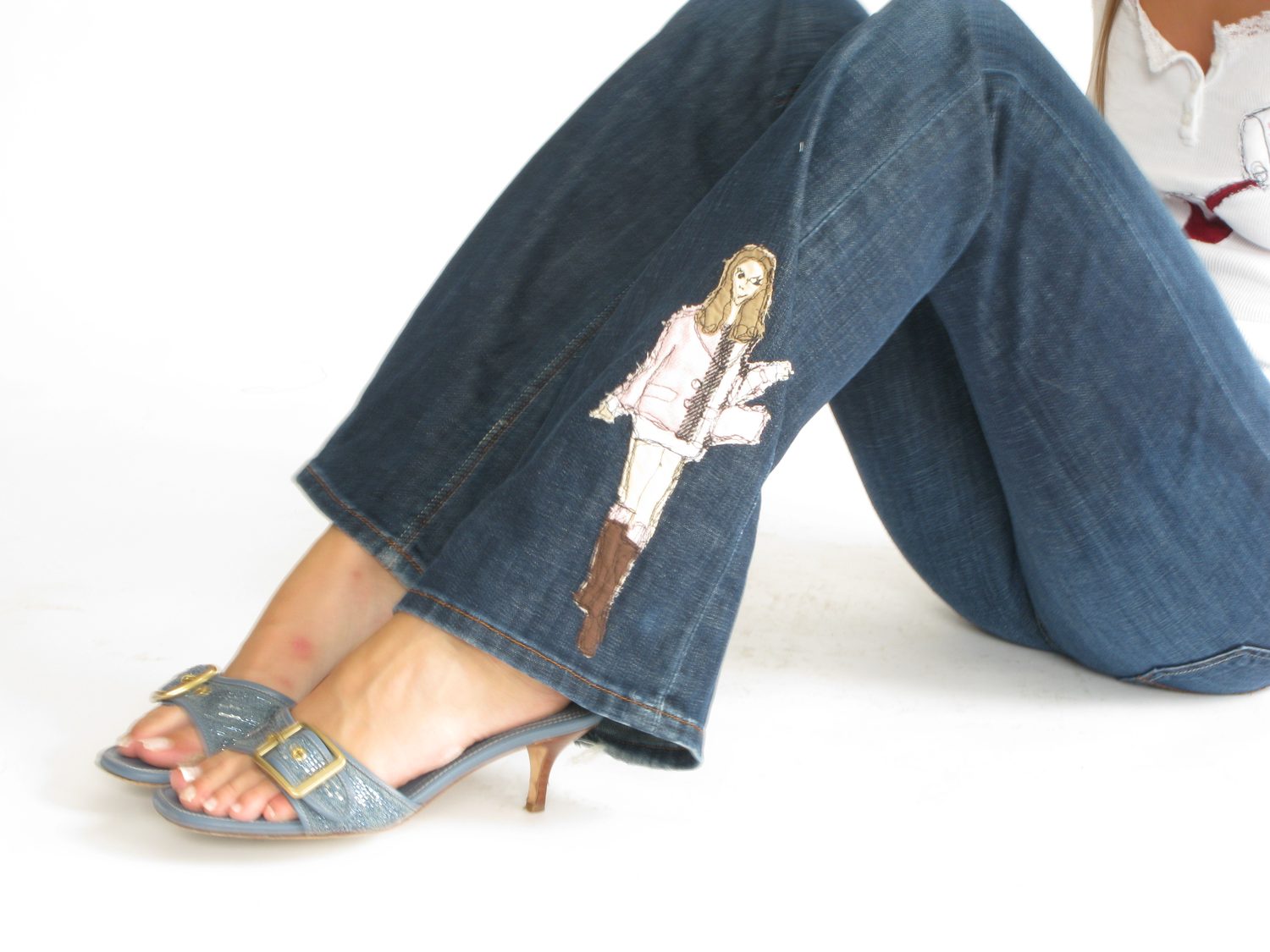 hand-painted fashion illustration on the jean hem with kitten heels