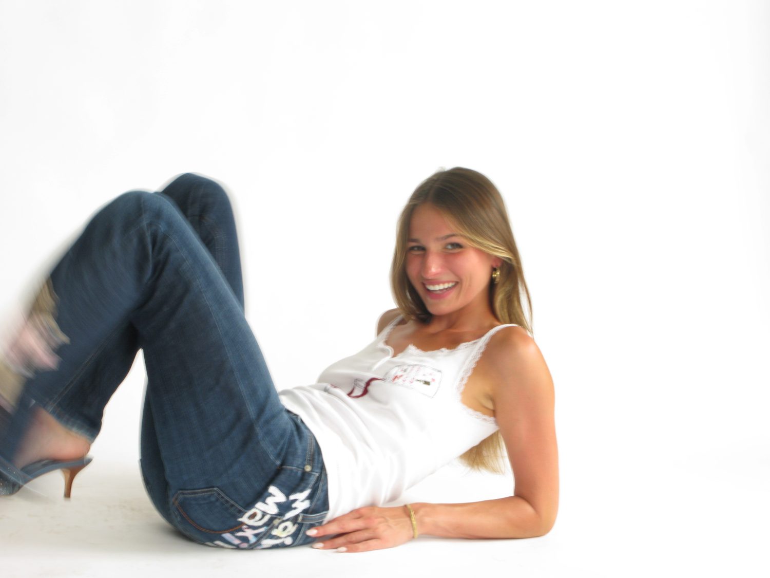 muse lounging in the wine glass tank and painted jeans
